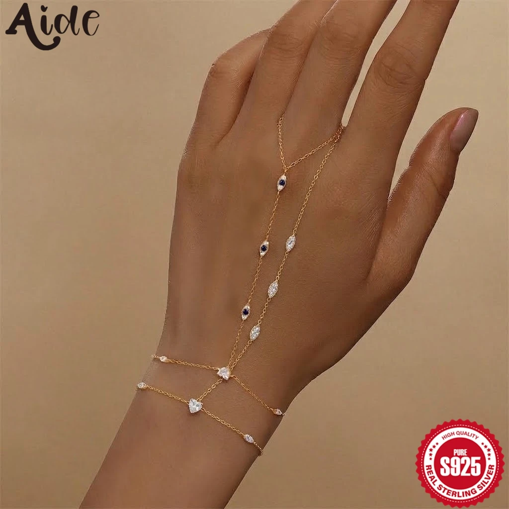 aide-925スターリングシルバー製、繊細なデザインの重ね付け可能なブルーアイジルコンリンクチェーンブレスレット。女性向けのリングチェーンブレスレットで、感謝祭の贈り物に最適。