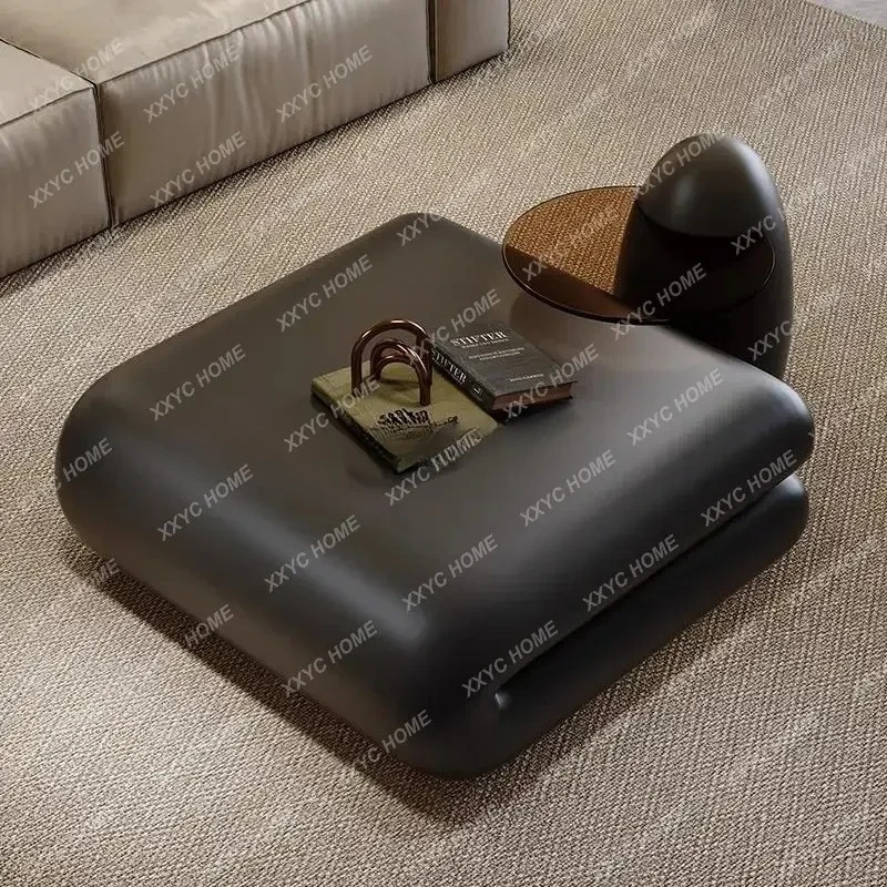 

A minimalist special shape black fiberglass creative book coffee table light luxury living room tea table
