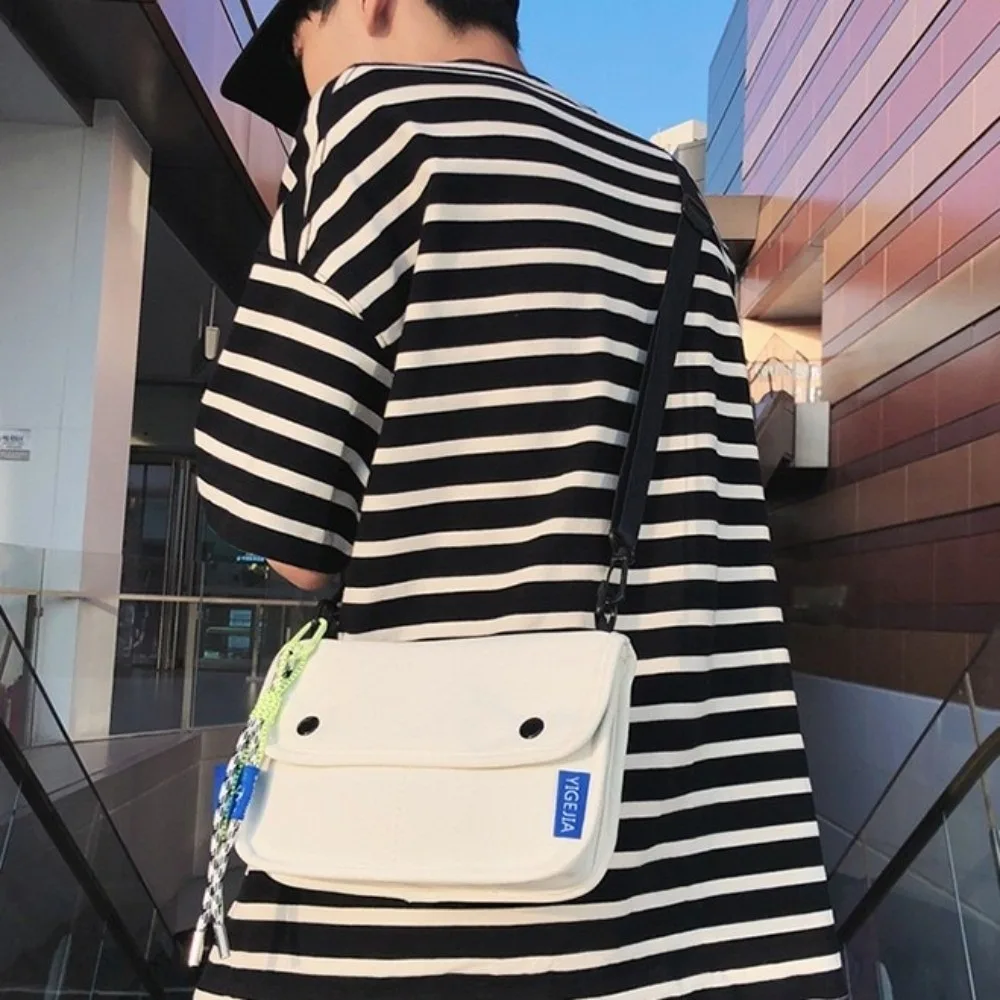 

Квадратная сумка для сообщений с несколькими карманами, однотонная нейлоновая сумка через плечо в корейском стиле с подвеской, большая вместительная мужская сумка на плечо