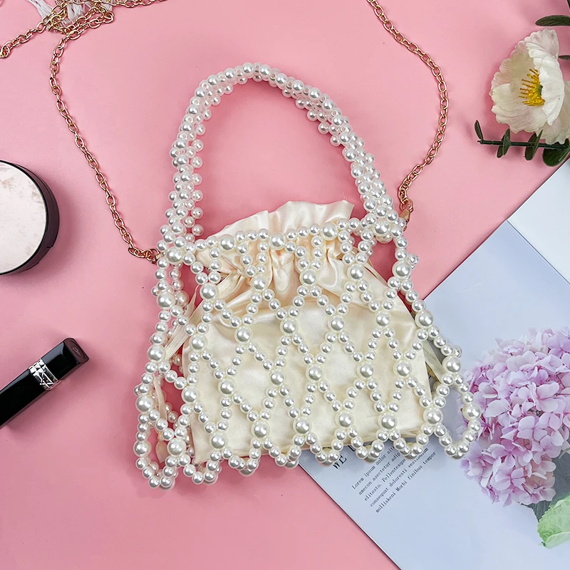 Cross border trend pearl bag hollow bead bag women's bag shoulder crossbody bag vacation pearl woven bag hand-held square bag