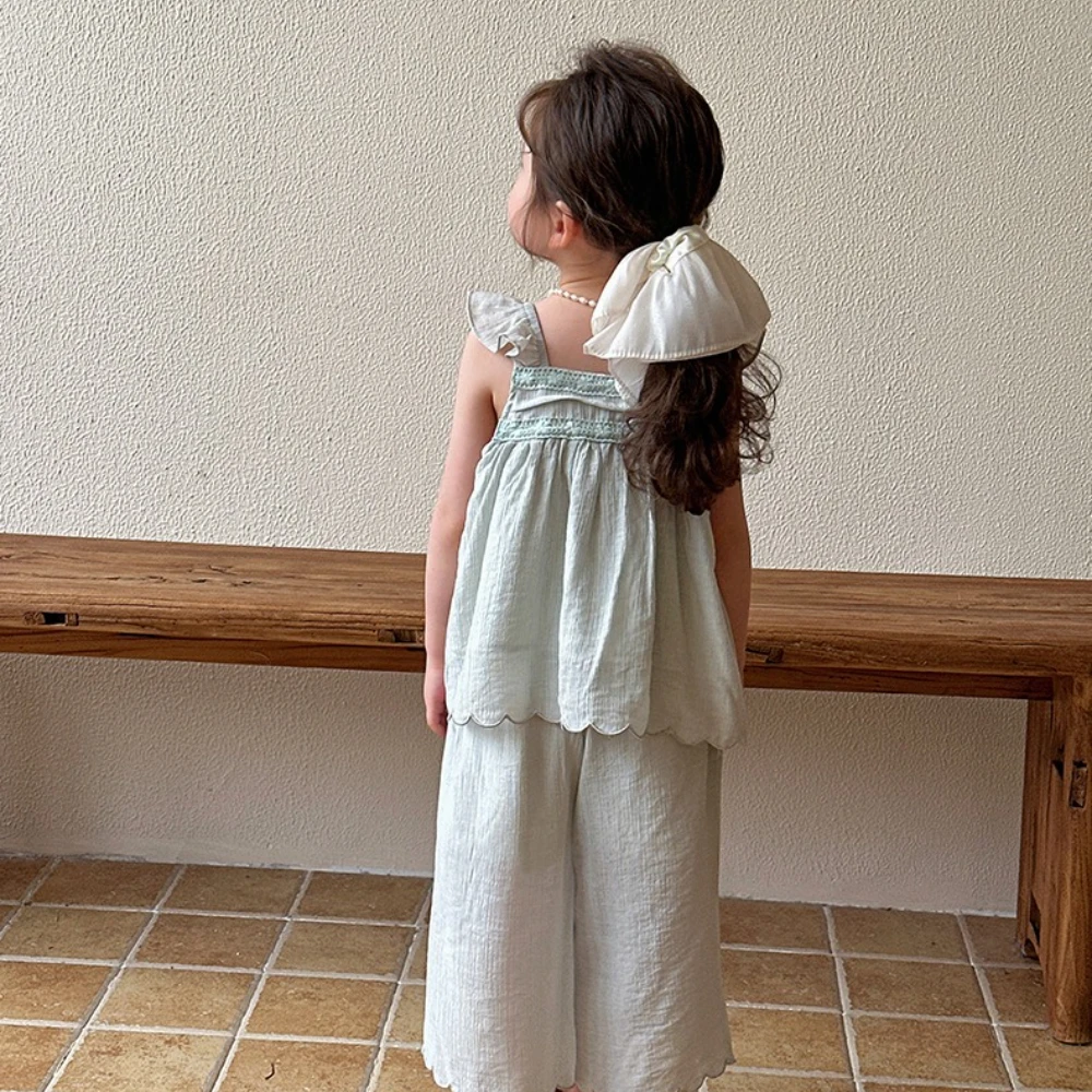 Bear Leader النسخة الكورية بلون الفتيات ملابس الصيف جديد أنيق الحلو حزام أعلى + بانت 2 قطعة مجموعة أزياء ملابس أطفال غير رسمية