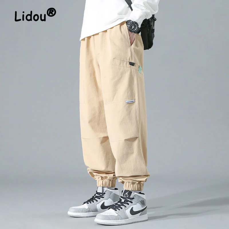 

Brief Fashion Solid Color Pasting Cloth Men's Cargo Pants New Classic Loose Street Casual Tie One's Feet Pocket Male Trousers