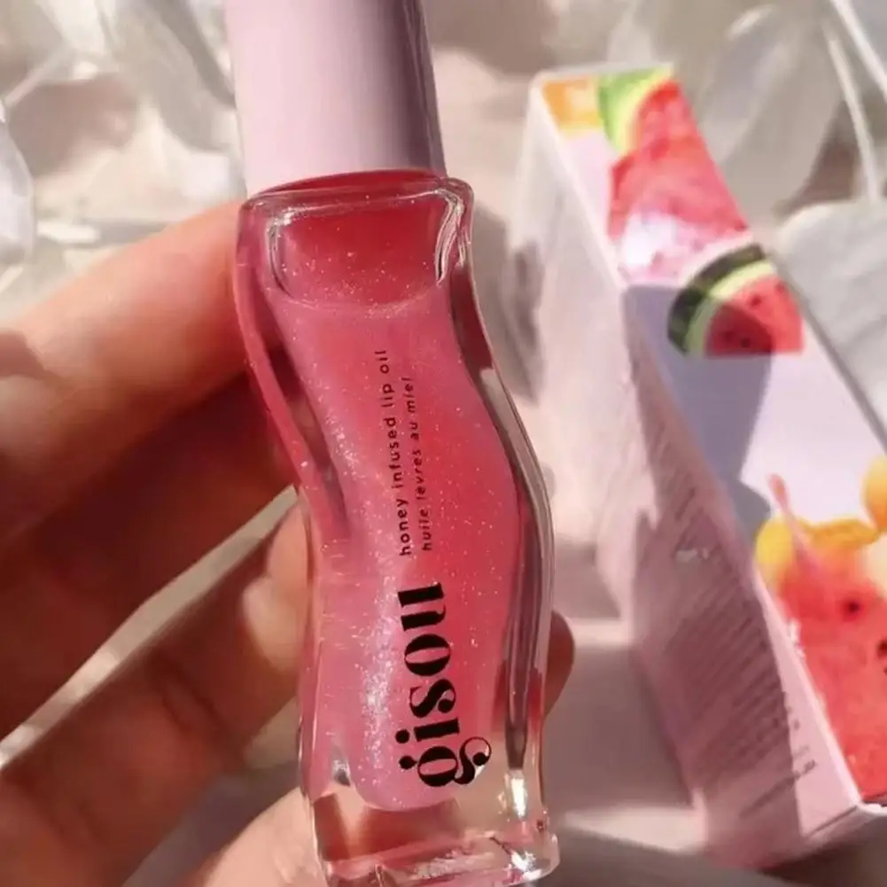 الفاكهة العسل جوهر زيت الشفاه مثير طبطب الشفاه هلام الفراولة ملون الشفاه السائل مقاوم للماء ترطيب النفط ملمع الشفاه ماكياج ماكياج ﻿