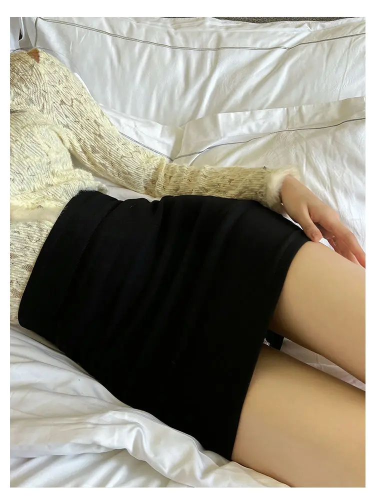 กระโปรงยางยืดสีดํากระโปรงสั้นผู้หญิงเอวสูงสะโพกแน่นสั้น Ol Professional One-Step กระโปรง