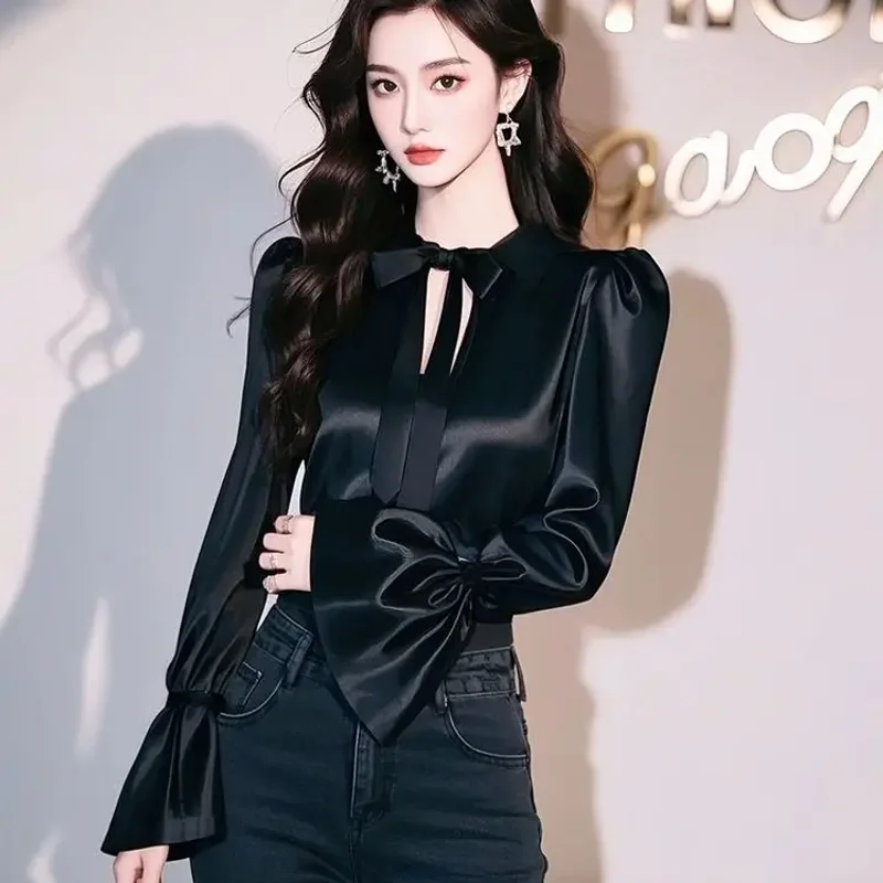 

French Bow Black Hollow Satin Shirt for Women in Spring and Autumn Chic Flared Sleeve Top