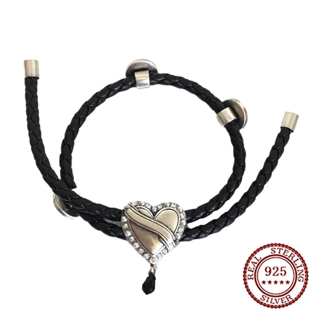 

2025 New Trendy Classic Black Leather Rope Love Pulling Bracelet Women's Heart Shaped Diamond Set Pearl Bracelet
