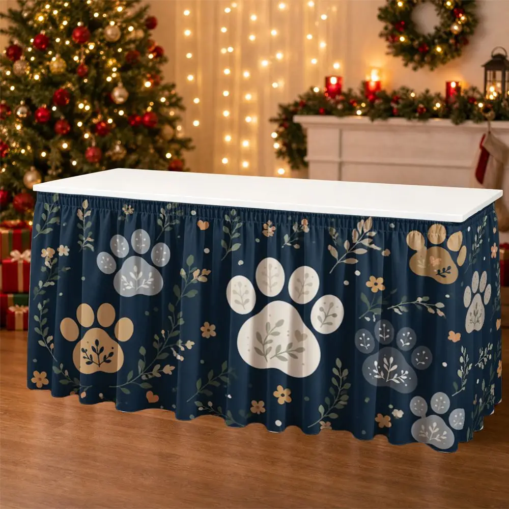 One party table skirt decoration featuring claw prints and floral patterns, with ruffled edges on the tablecloth.