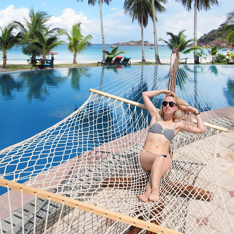 

Hanging chair with wooden stick, tassel hammock, cotton rope weaving, mesh grid, swimming pool, seaside beach,