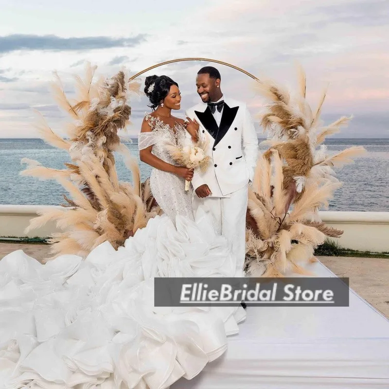 فساتين زفاف نيجيرية أنيقة فاخرة برقبة شفافة وكشكشة كريستالية ذيل حورية البحر الأفريقية مشد زي العرائس 2025 حسب الطلب