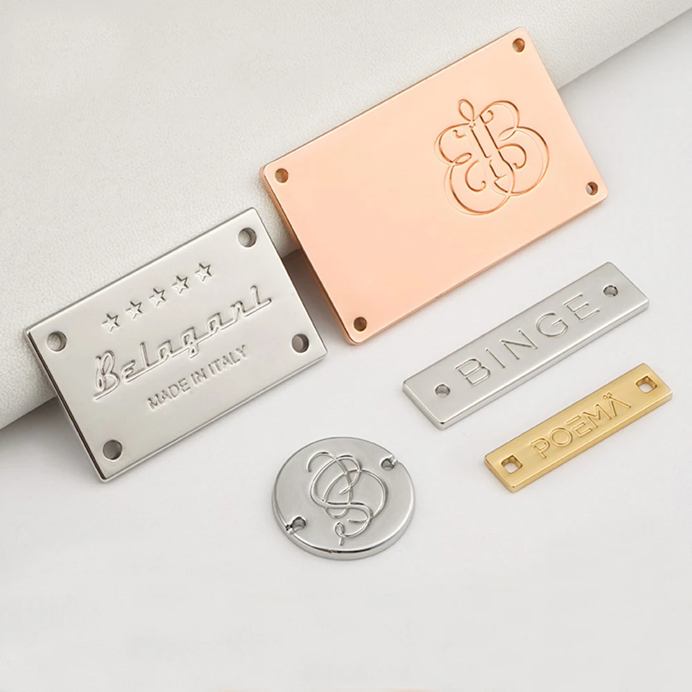 

Custom Die Cast Zinc Alloy Perforated Suture Clothing Label Luggage Letters, Electroplated Nameplates, Metal Logos