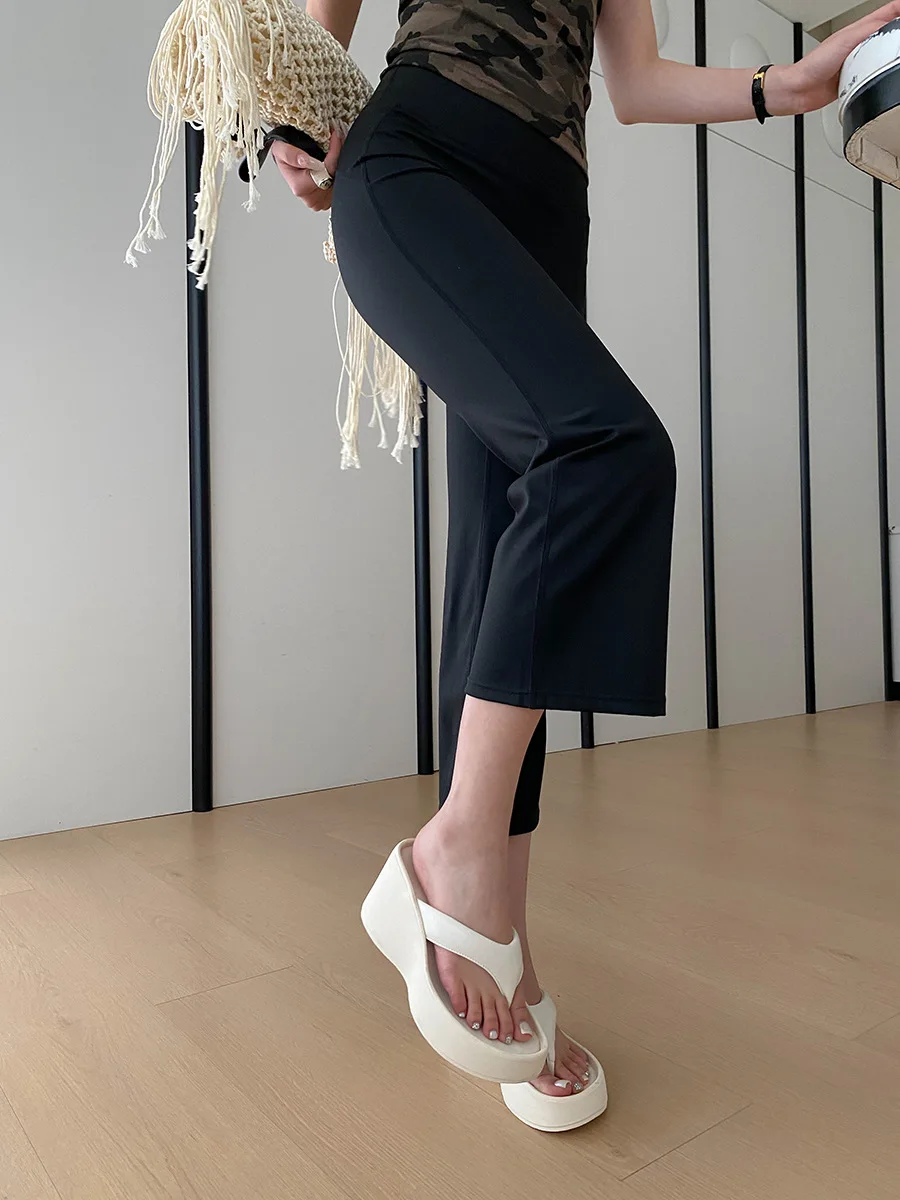 Sommerliche Damen-Yogahose in Uni-Farbe mit hoher Taille, Po-Lifting-Effekt, schmaler Passform, Bambusfaser-Beinen und leicht ausgestelltem Schnitt – Detail 16