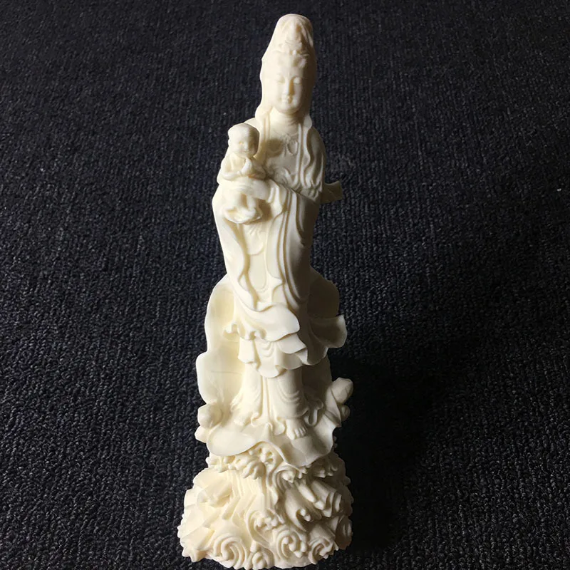 Ivory Nut Carved Child‑giving Guanyin Statue 1864.8cm Home Living Room Desktop Craft Ornament Blessing Table Display Decor