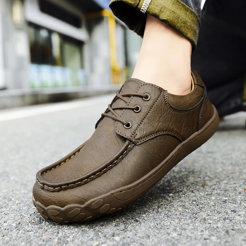 Mocasines Damyuan para hombre, novedad de 2024, zapatos sin cordones con punta redonda, zapatos planos suaves de cuero para caminar al aire libre para hombre, zapatillas de deporte de talla grande