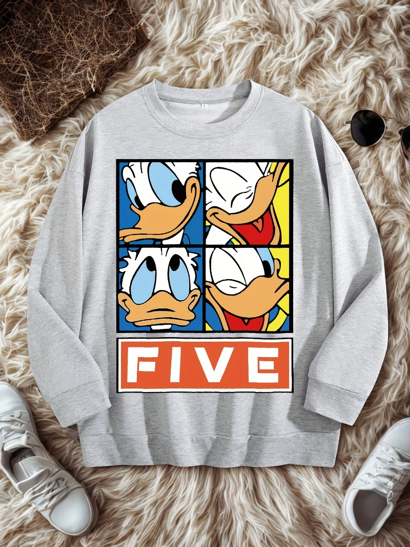 سويت شيرت Happy Cartoon Duck مع كلمة خماسية مطبوعة عليها، رقبة دائرية ناعمة وأكمام طويلة لملابس الخريف والشتاء غير الرسمية