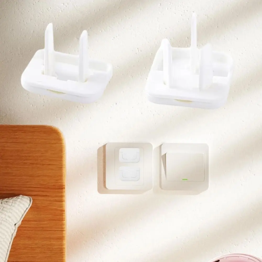 Copertura protettiva anti-shock elettrico tinta unita da 50 pezzi Copertura protettiva con design a due fori Protezione per presa per interruttore per bambini ABS