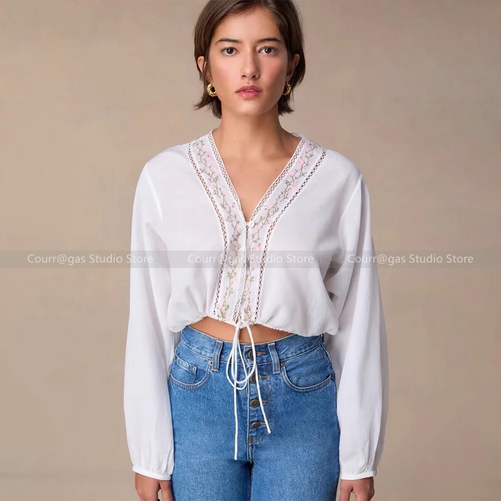 

French niche hollow floral embroidery loose sunscreen V-neck cotton shirt blouse female 24 summer new