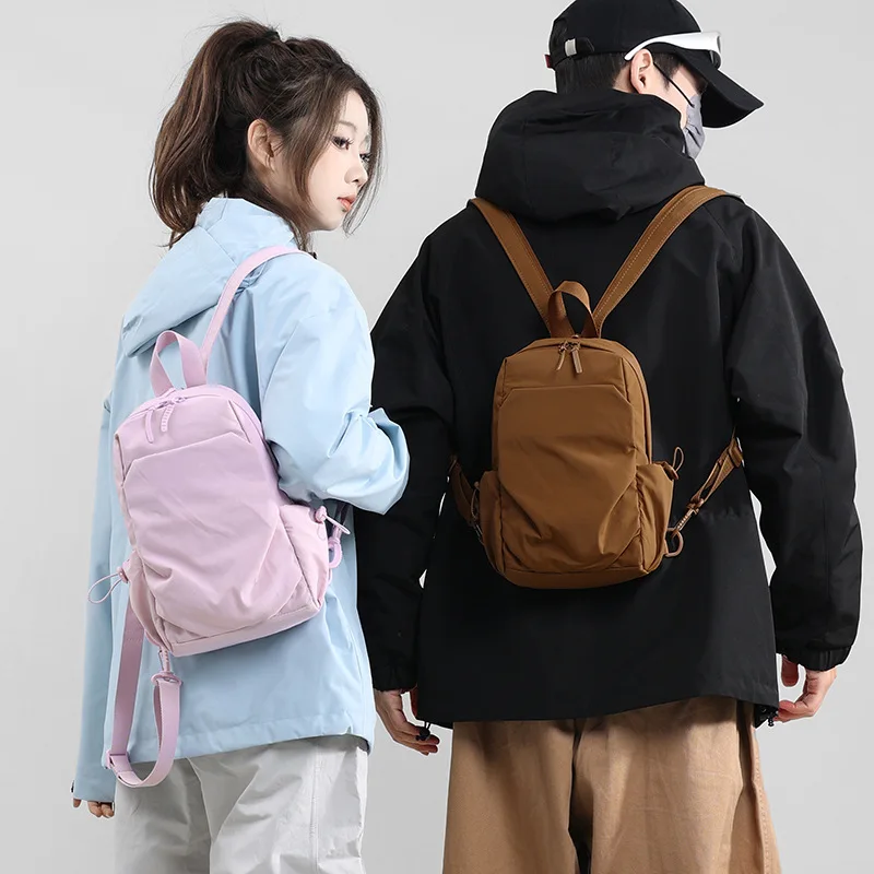 Unisex Minimalist Mini Waterproof Large Capacity Backpack Lightweight Convertible Sling Bag Fits 12 Inch Laptop Multi Colors For