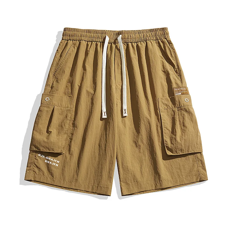 صيف جديد الرجال العلامة التجارية العصرية ملابس العمل السراويل الكورية فضفاضة كبيرة الحجم سراويل تقليدية تنفس التجفيف السريع أزياء الشارع