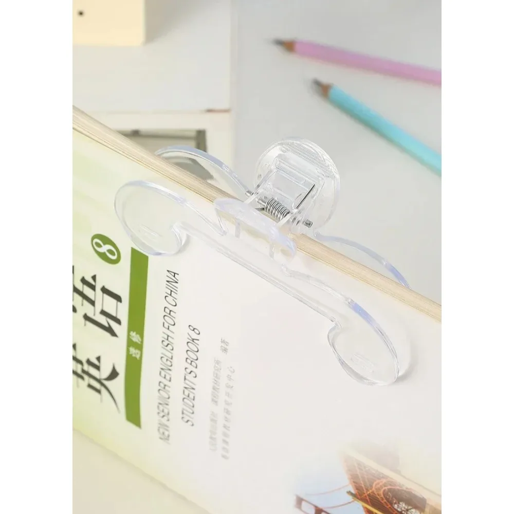 Clip de plástico transparente para libros con soporte, ayuda para la lectura, clip fijo para libros, marcapáginas, papelería, suministros escolares, 1 ud.