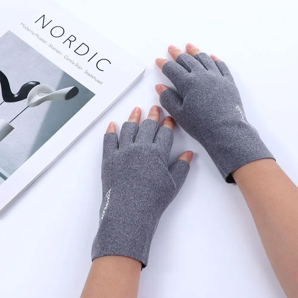 Guanti caldi in tessuto tinta unita a prova di freddo con vento elastico alla moda Guanti senza dita con mezze dita Guanti da donna