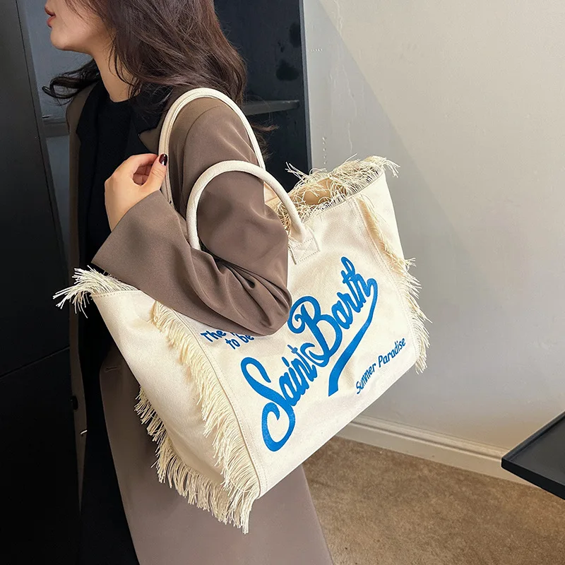 Popular Korean letters tassel canvas bag large-capacity bag simple commuting students to single shoulder Tote bag