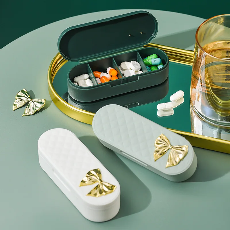 

Pill box portable mini small sealed morning, afternoon, mid and evening remind to pack pills with a medicine box light luxury