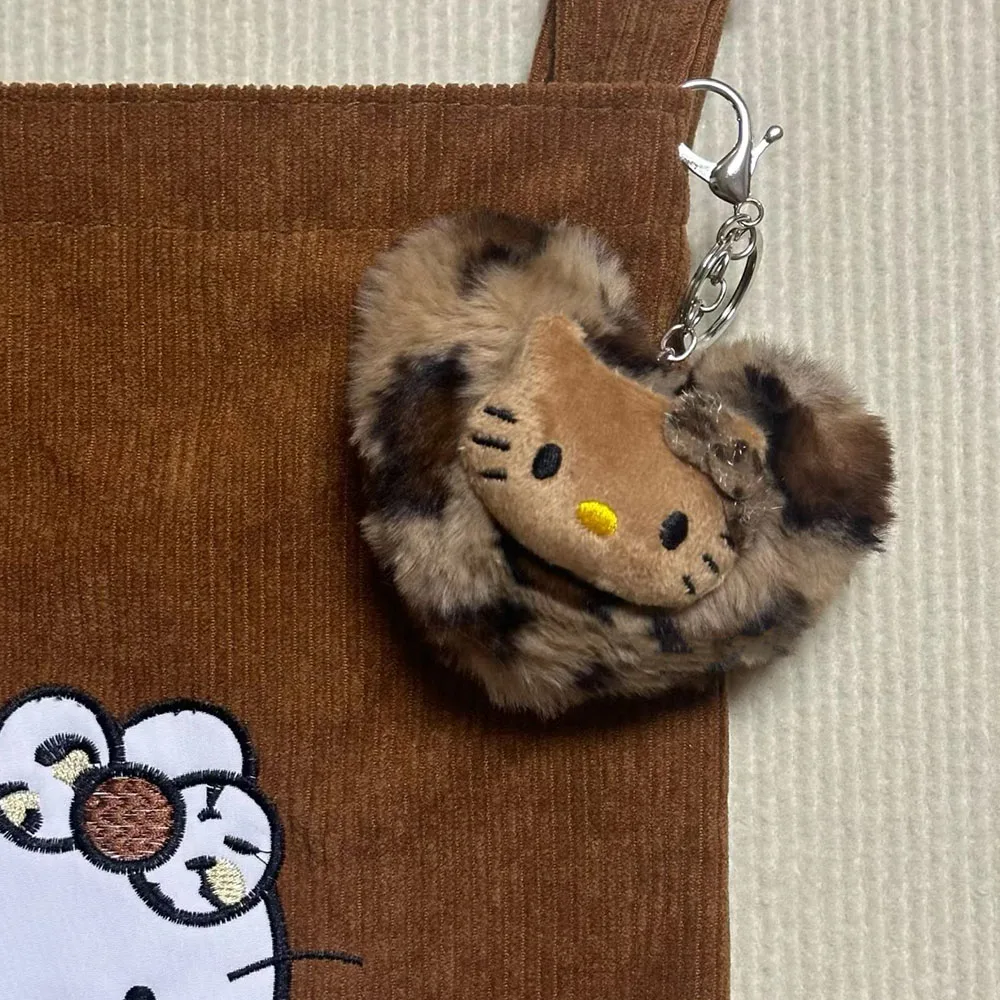 Sanrio Hello Kitty Portachiavi per bambole retrò con stampa leopardata Kawaii Anime Toy Cartoon Fashion Bag Accessori Portachiavi Regali