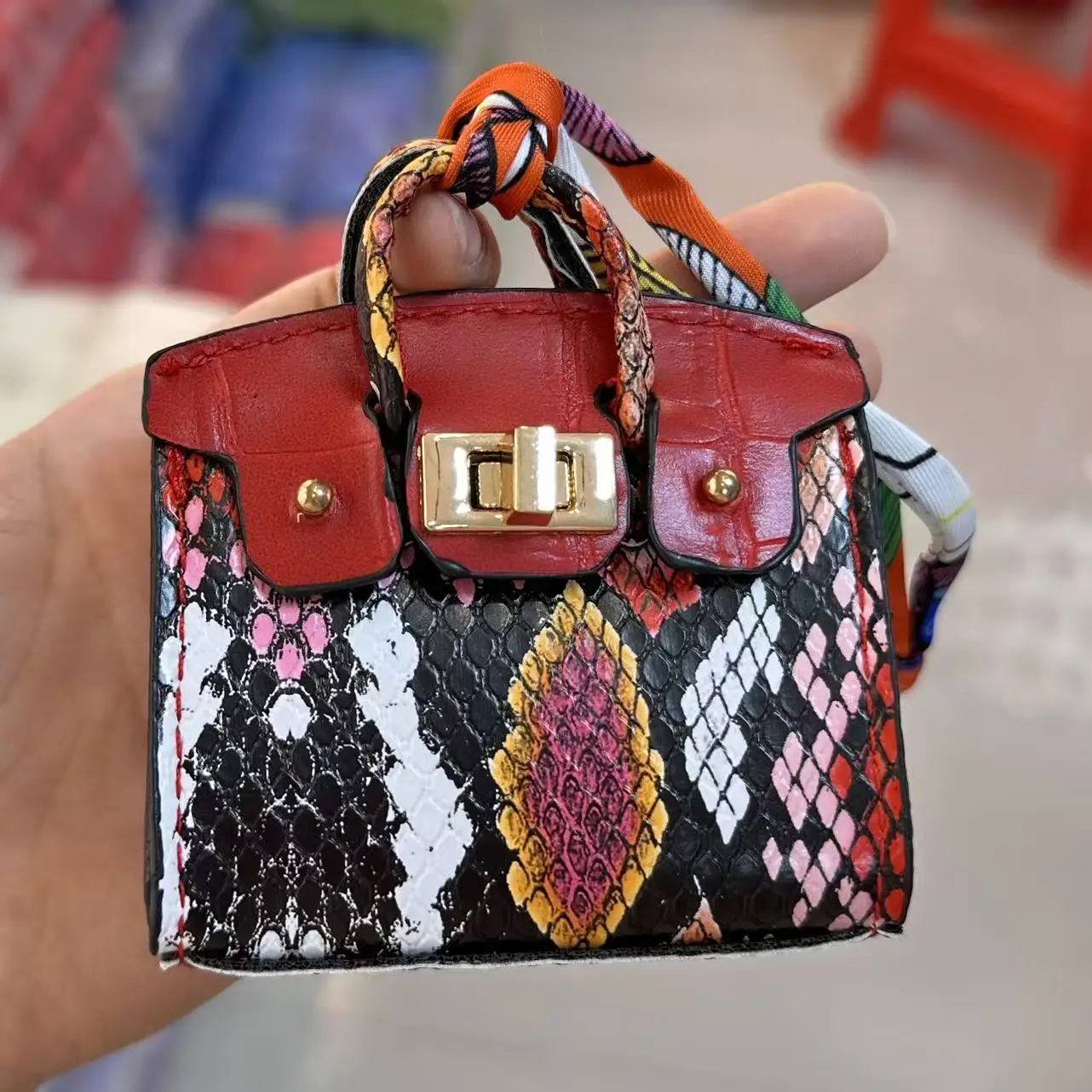 1 Stück 2026 neue Schlangenhaut-Mini-Multifunktionstasche, Joker-Münzbörse, Anhänger, Schlüsselanhänger, Bluetooth-Kopfhörertasche – Detail 1