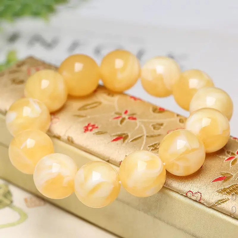 Optimized Russian white nectar bracelet made from raw stone, chicken fat gold, honey amber, and fragmented ornamental ambe