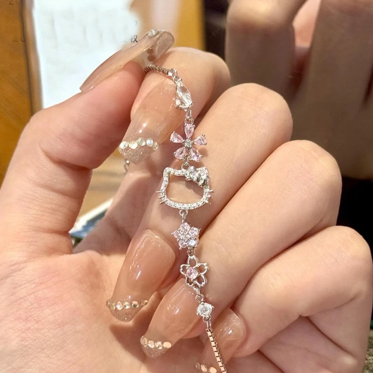 

Miniso cute Sanrio HelloKitty cool Lomi bracelet for women with high looks niche design light luxury kidie cat accessories