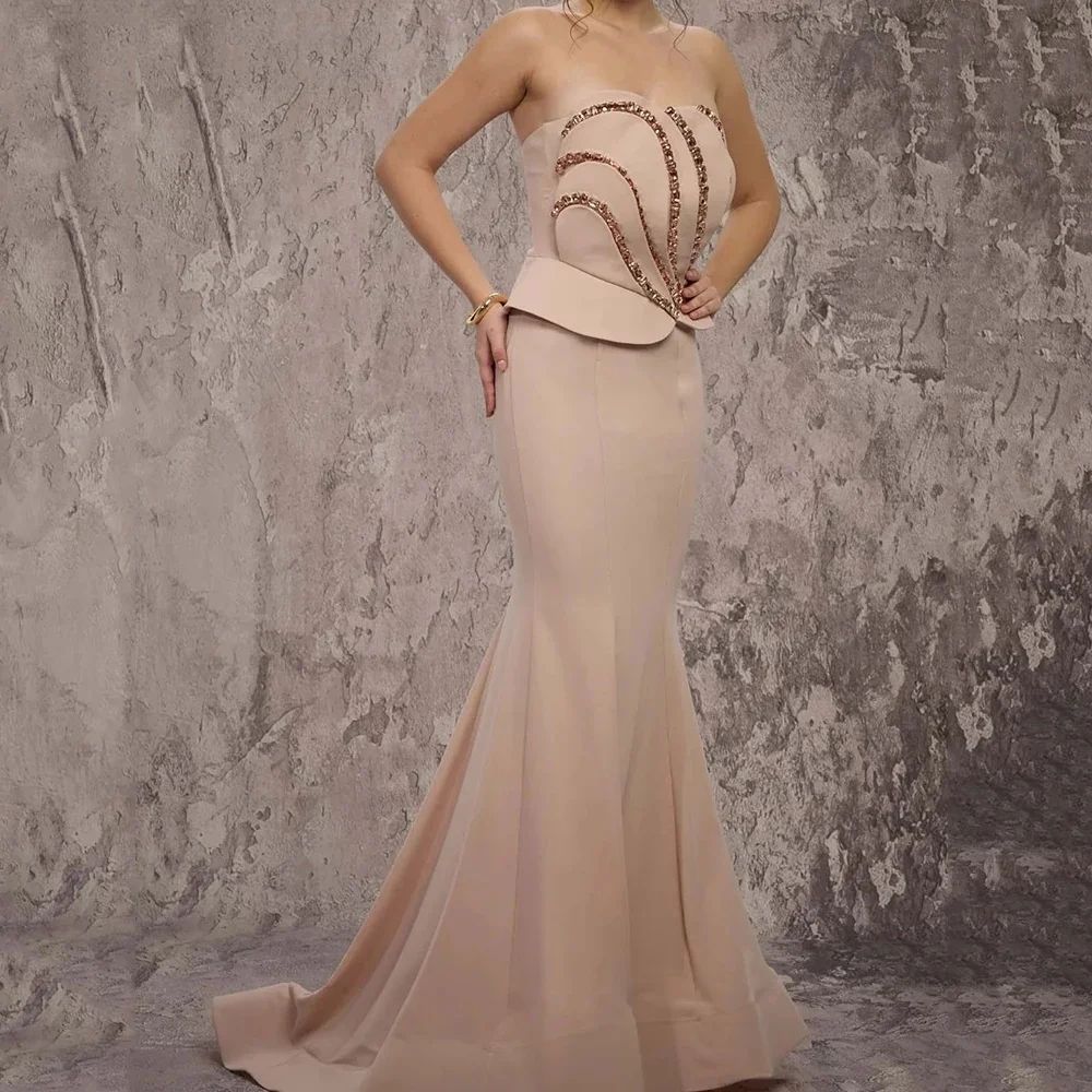 Sculptural shell strapless gown with 3D tailored shaping, fully customized in all sizes. Soft matte fabric is gentle against ski