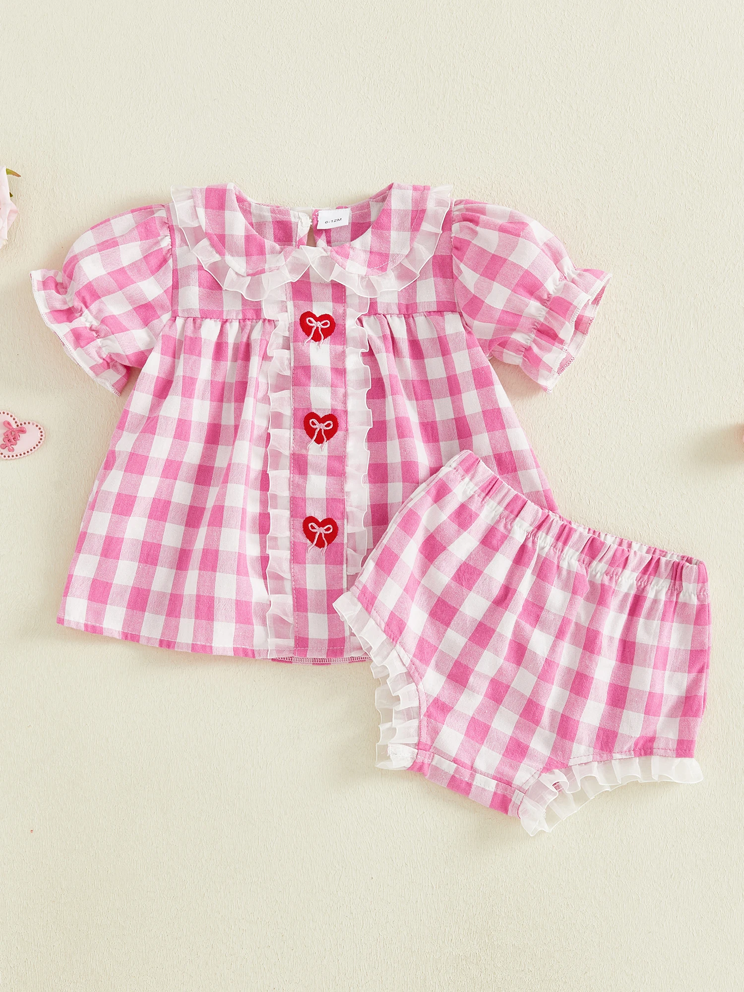 

Летние комплекты из двух предметов для девочек: топы с рюшами на рукавах и круглым вырезом с цветочным принтом и джинсовые шорты с бантом