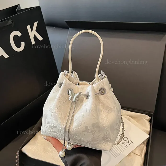 2026 New Luxury Women's Shoulder Bag Fashion Chain Pulling Rope Crossbody Bag Style Versatile Large Capacity Embroidered Handbag