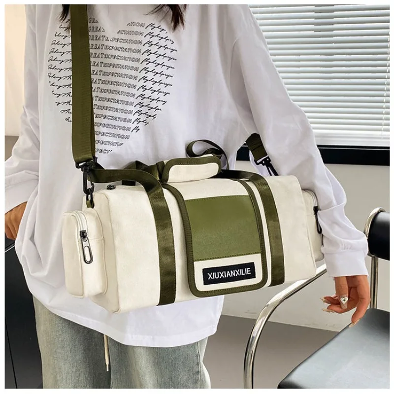 New Neutral Leisure Travel Canvas Pillow Bag with Large Capacity Sports and Fitness Storage Handheld One Shoulder Crossbody Bag