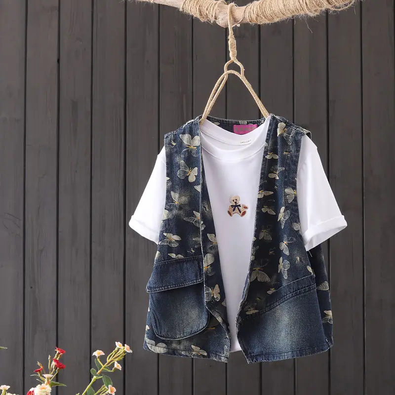 Dames V-Hals Dunne 2024 Lente En Zomer Nieuwe Veelzijdige Losse Mouwloze Korte Bedrukte Patchwork Zakken Casual Denim Vest Jas