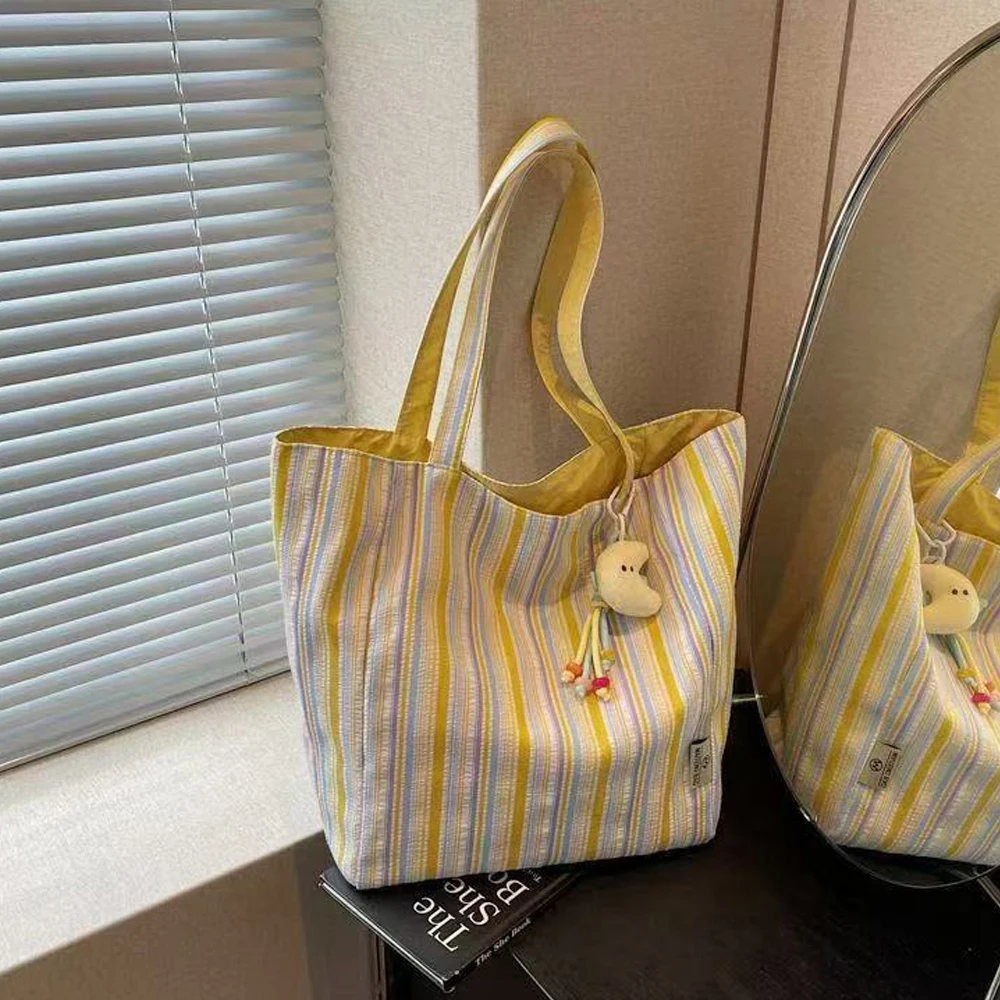 Modische und vielseitige Canvas-Tasche, frische und geräumige, gestreifte, lässige Umhängetasche für den täglichen Gebrauch. – Detail 5