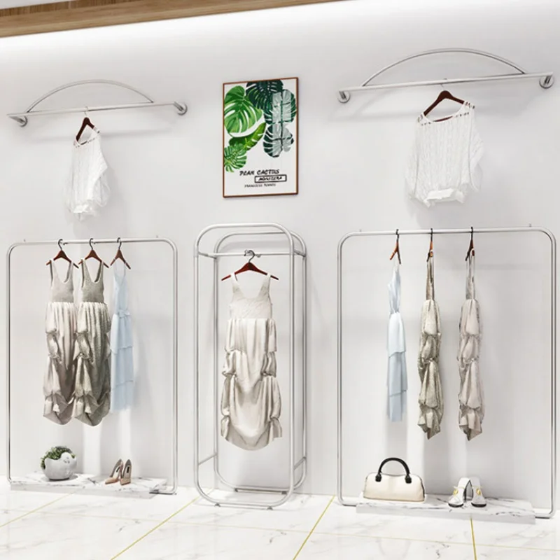 custom，Retail Clothing Store Interior Design Gold Garment Shelf Wall Mounted Clothing Display Racks