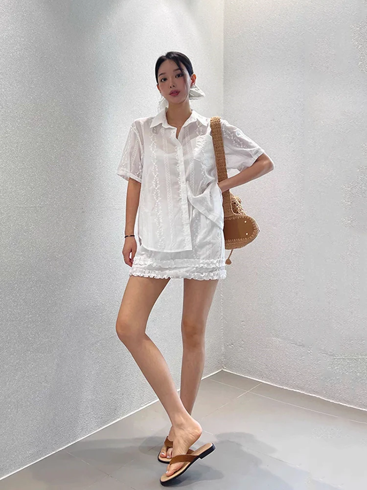 Liangliang デザインヘビー刺繍レースシャツ女性の夏の新スタイル小規模オーディエンススプライシングレースハーフスカート 2 点セット