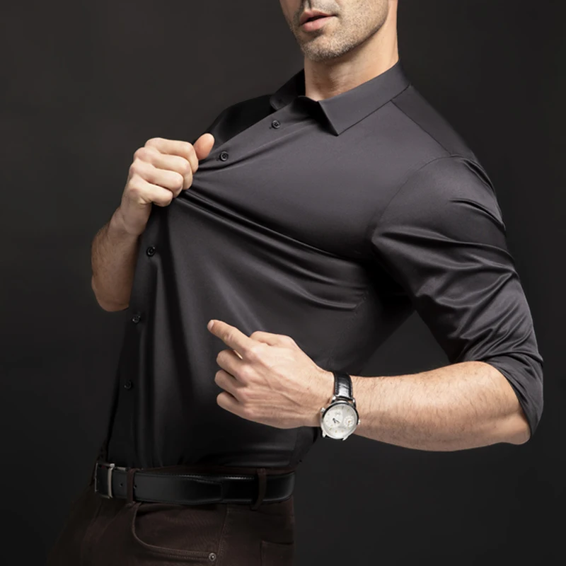 Nuova camicia elastica a maniche lunghe per moda uomo, affari, tempo libero, tinta unita non stirata, camicia bianca da uomo professionale