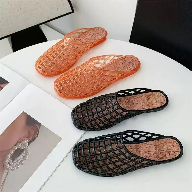 2026 Women's New luxury brand Flat slippers with Hollow PVC Breathable Summer Outerwear Baotou Bag and Casual slippers