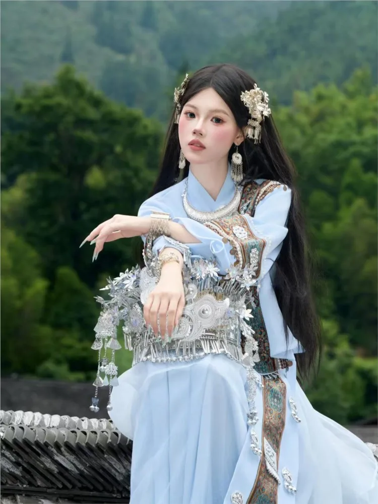 

Blue and white top with a flowing chiffon skirt for photography travel outings