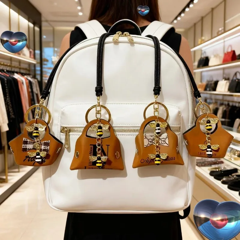 Monedero pequeño de poliuretano con forma de llavero, colgante para bolso, decoración de estilo Miu para bolsos pequeños, decoración creativa para llaveros, con un toque de elegancia.