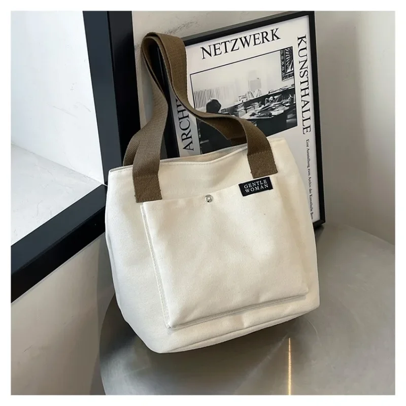 2025 New Canvas Simple Zipper Women's Designer Handbag Popular Solid Color Trendy Zipper Casual Good Looking Shoulder Bag