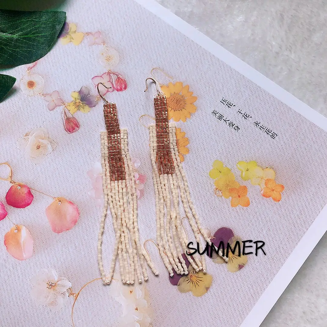 ZGMXR Rice bead earrings Color match Geometry Design Tassel Originality Hand knitting Bohemia Alloy Fashion  Beaded earrings