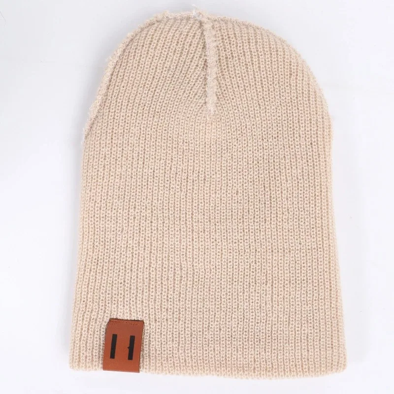 Children knitted wool pullover hat autumn and winter leather label solid color warm baby knitted cap with parent-child models