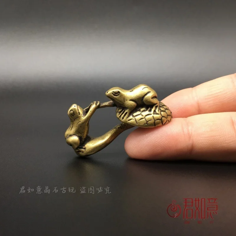 

Solid Brass Frog Figurine with Two Frogs Sitting on a Mushroom, Small Brass Toy