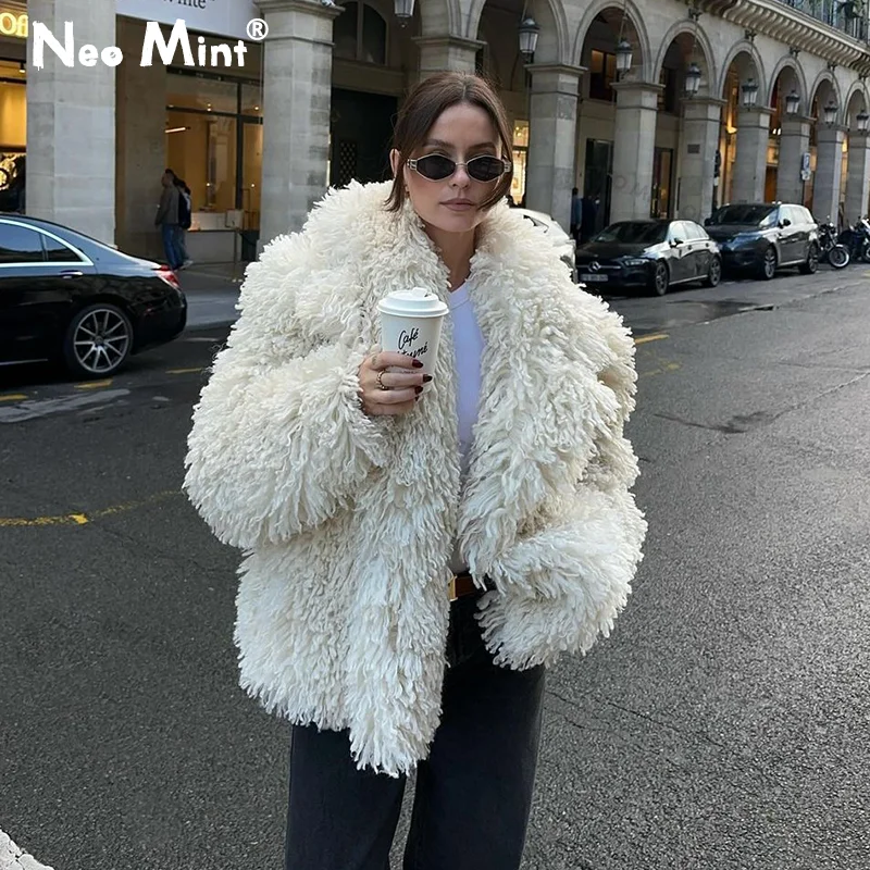 

Neo Mint 2024 Winter Elegant Lapel Faux Fur Coat Women Blogger Brand Fashion Loose Solid Outerwear Curly Hairy Fur Jacket Female