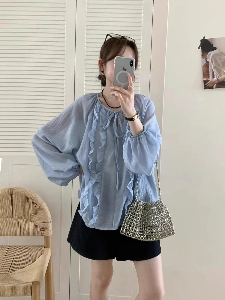 

Clothland Women Sweet Ruffled Blouse Lace Up Lantern Sleeve Thin Shirt Cute Female Casual Fashion Tops LB296