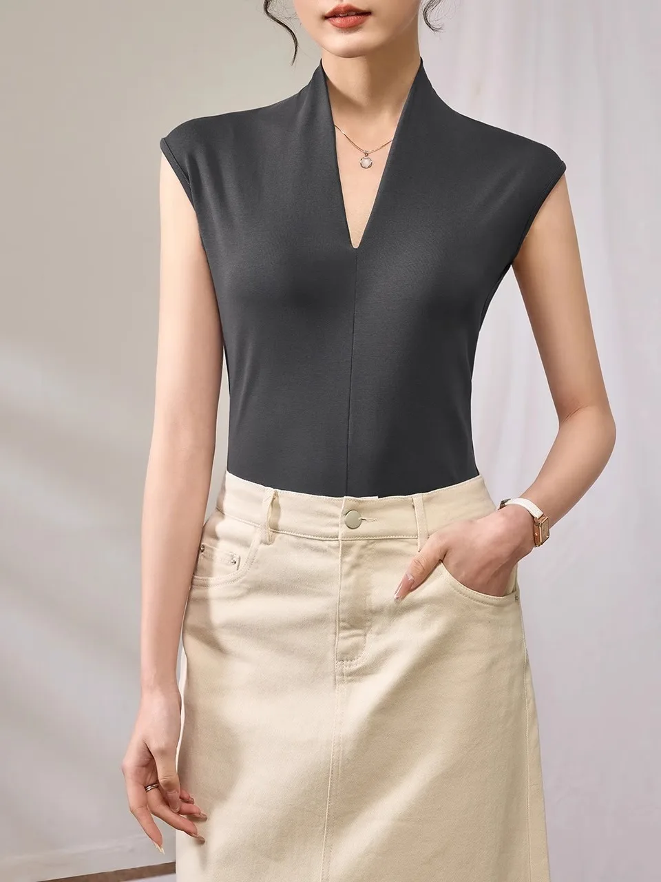 تي شيرت نسائي كاجوال بدون أكمام بلون واحد بأسلوب الشارع ضيق مناسب للصيف قصير للغاية بسماكة عادية