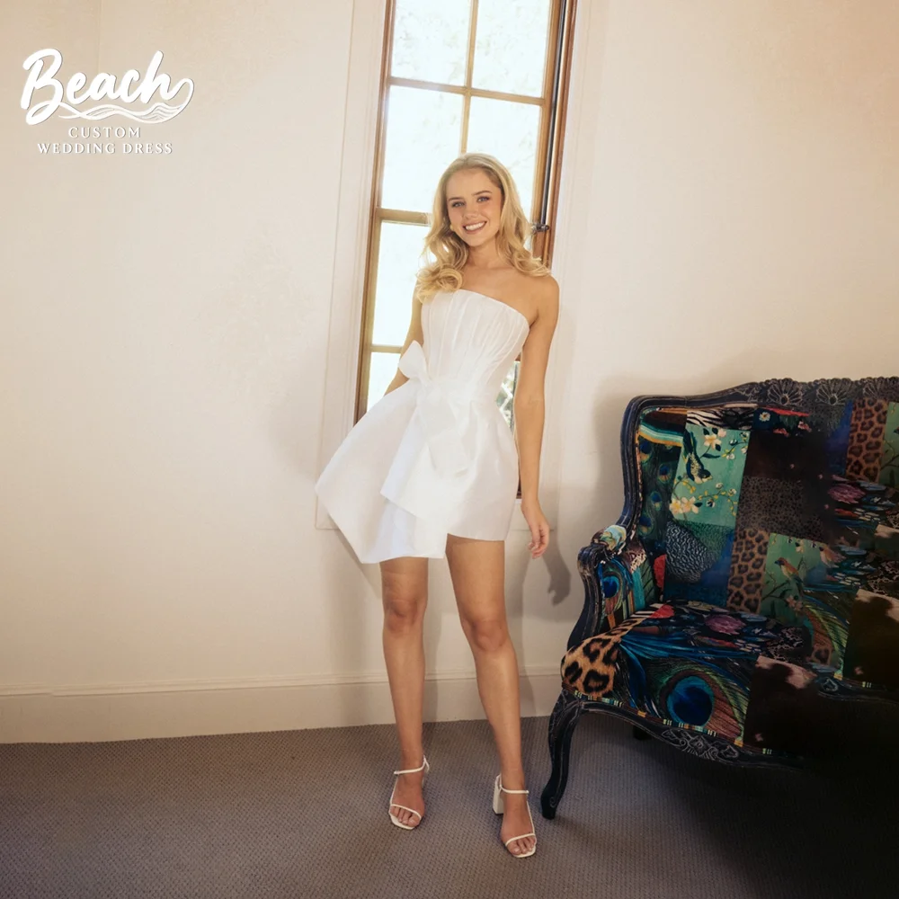 Strand eenvoudige mouwloze strapless backless strik mini trouwjurk 2025, eenvoudige elegante bruidsjurken vestidos de novia aangepast